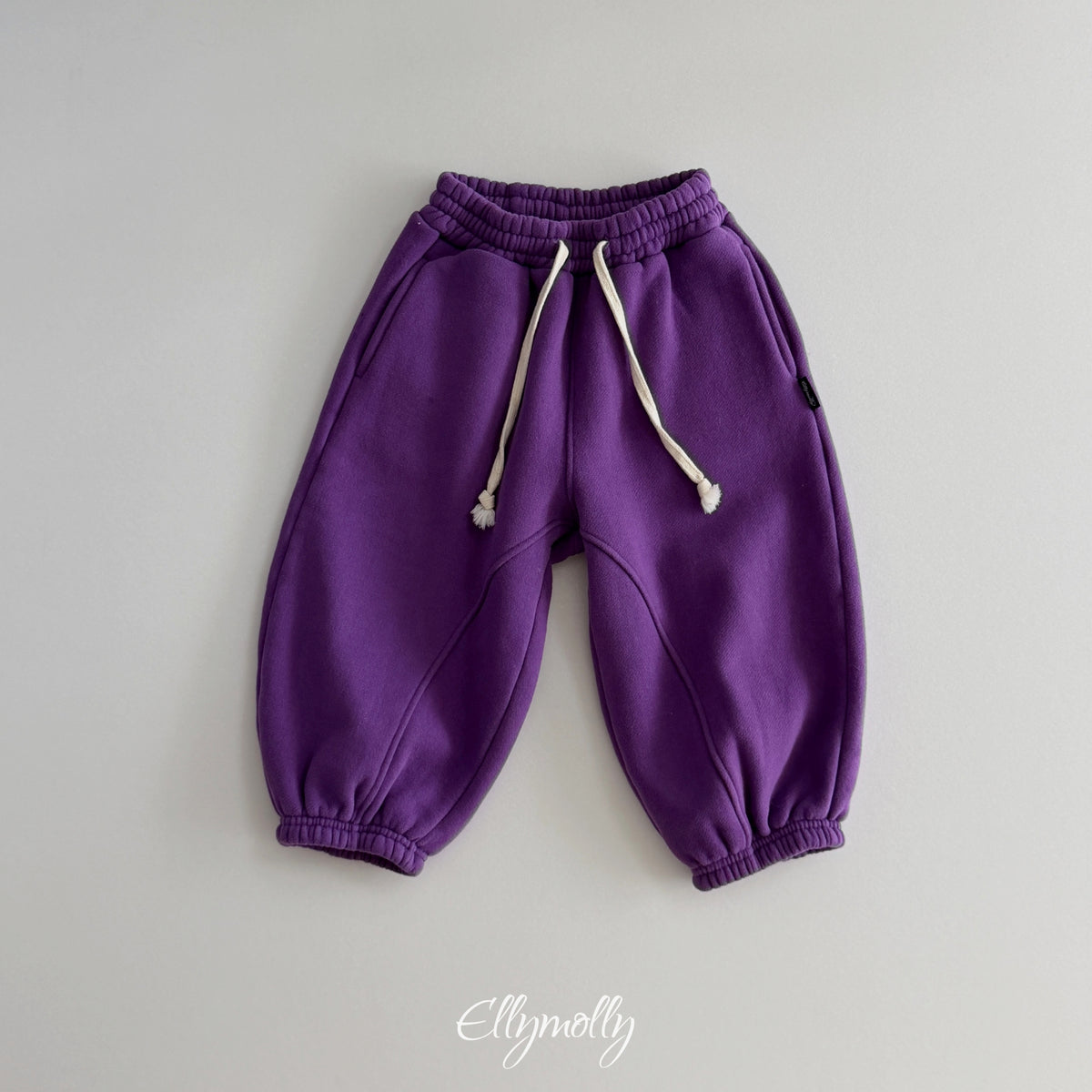 ELLY MOLLY｜アーチドジョガーパンツ【予約商品】