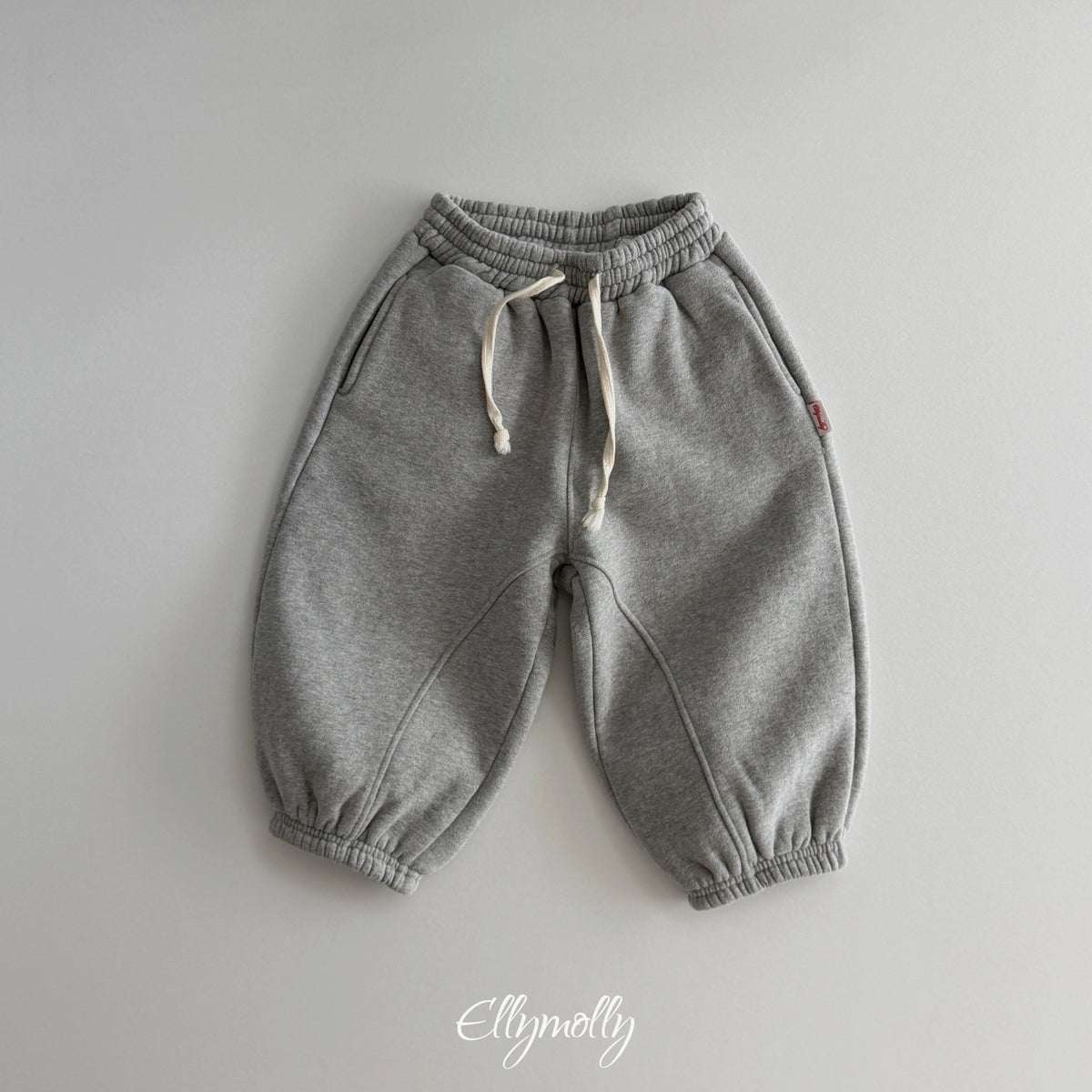 ELLY MOLLY｜アーチドジョガーパンツ【予約商品】