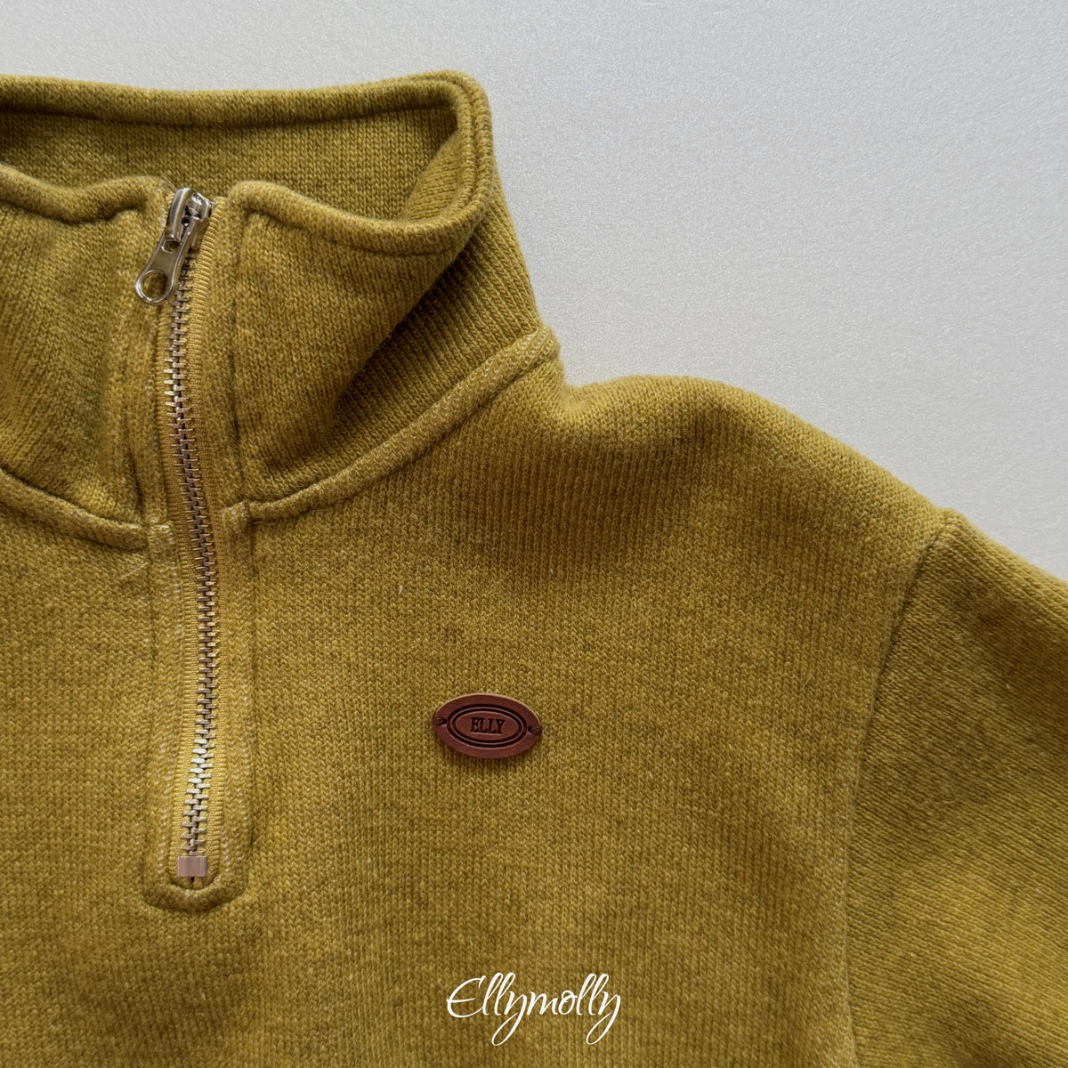 ELLY MOLLY｜アルデン ウールハーフジップ【予約商品】